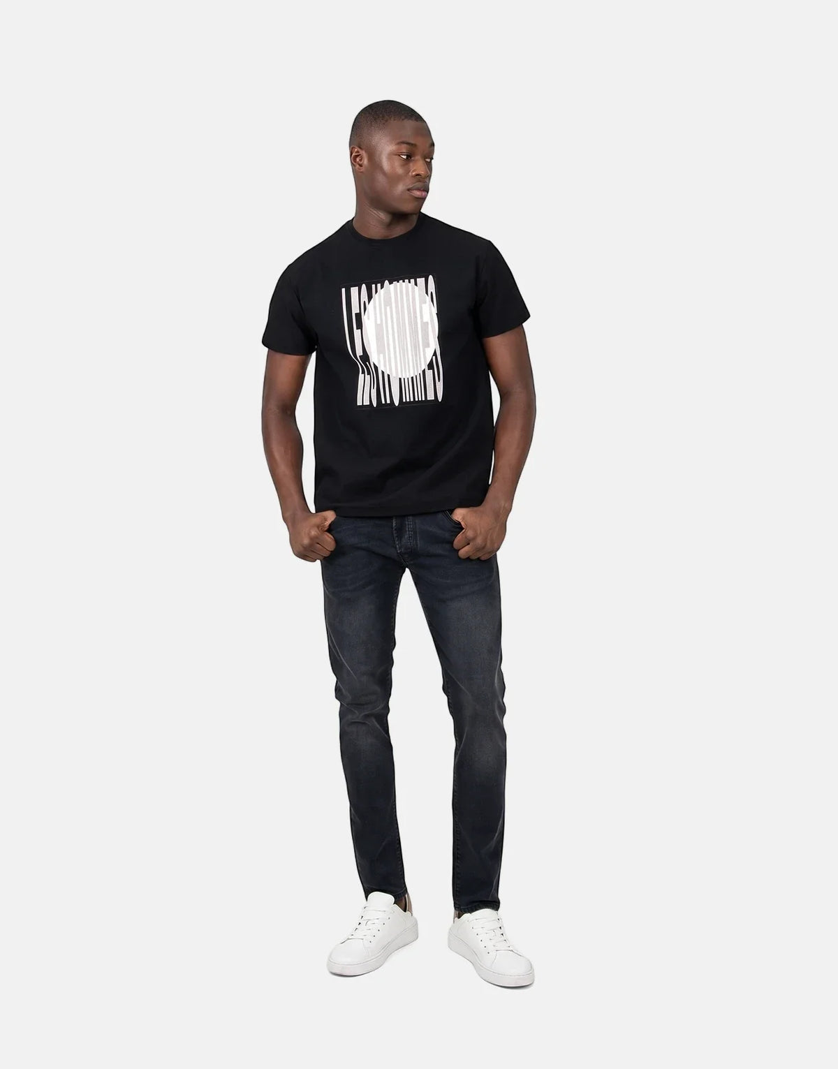 Les Hommes Logo Print Black T-Shirt featuring a white circular logo with striped background on a black cotton tee.