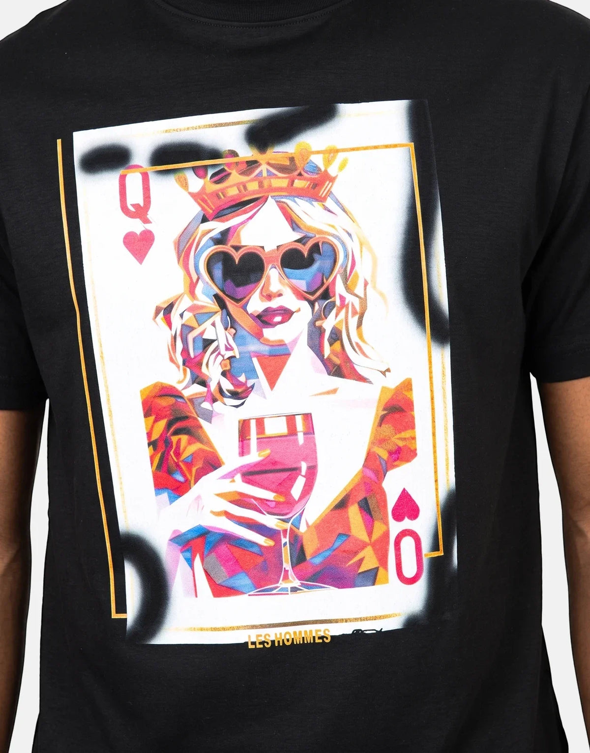 Close-up of a Les Hommes Queen Of Hearts Black T-Shirt featuring a vibrant pop-art graphic of a crowned woman in heart